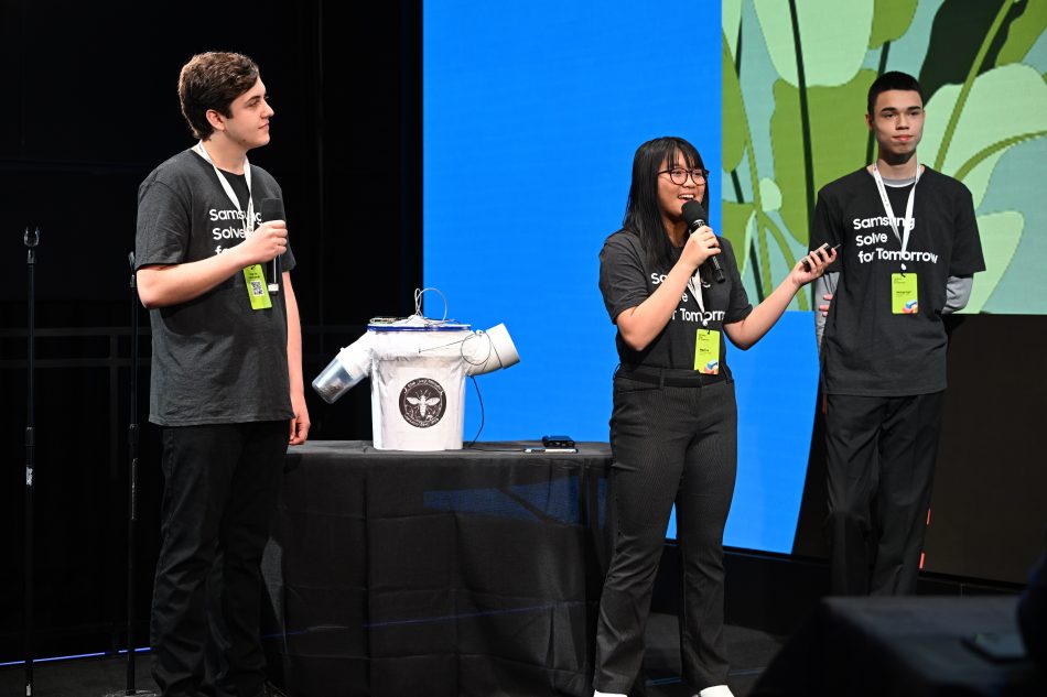(L-R) Students Matthew Livingston, Ngan Le and George Kopf of Princeton High School in Princeton, New Jersey present their STEM project to tackle food waste using the black soldier fly to judges at the Samsung Solve for Tomorrow National Finalist Pitch Event on Monday, April 25, 2022 in New York City at Samsung 837.