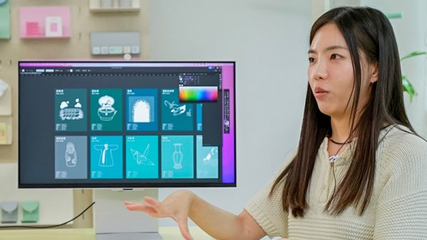 Sohyun Shin. founder of OIMU, sitting in front of a Samsung ViewFinity S9 monitor